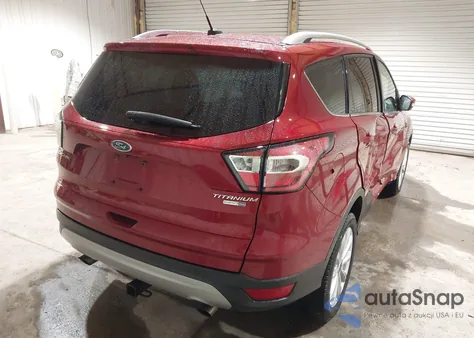 2017 Ford Escape Titanium z USA, uszkodzony, nr VIN 1FMCU9J9XHUC20359